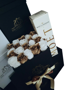 Square black box with a mix of white and gold roses