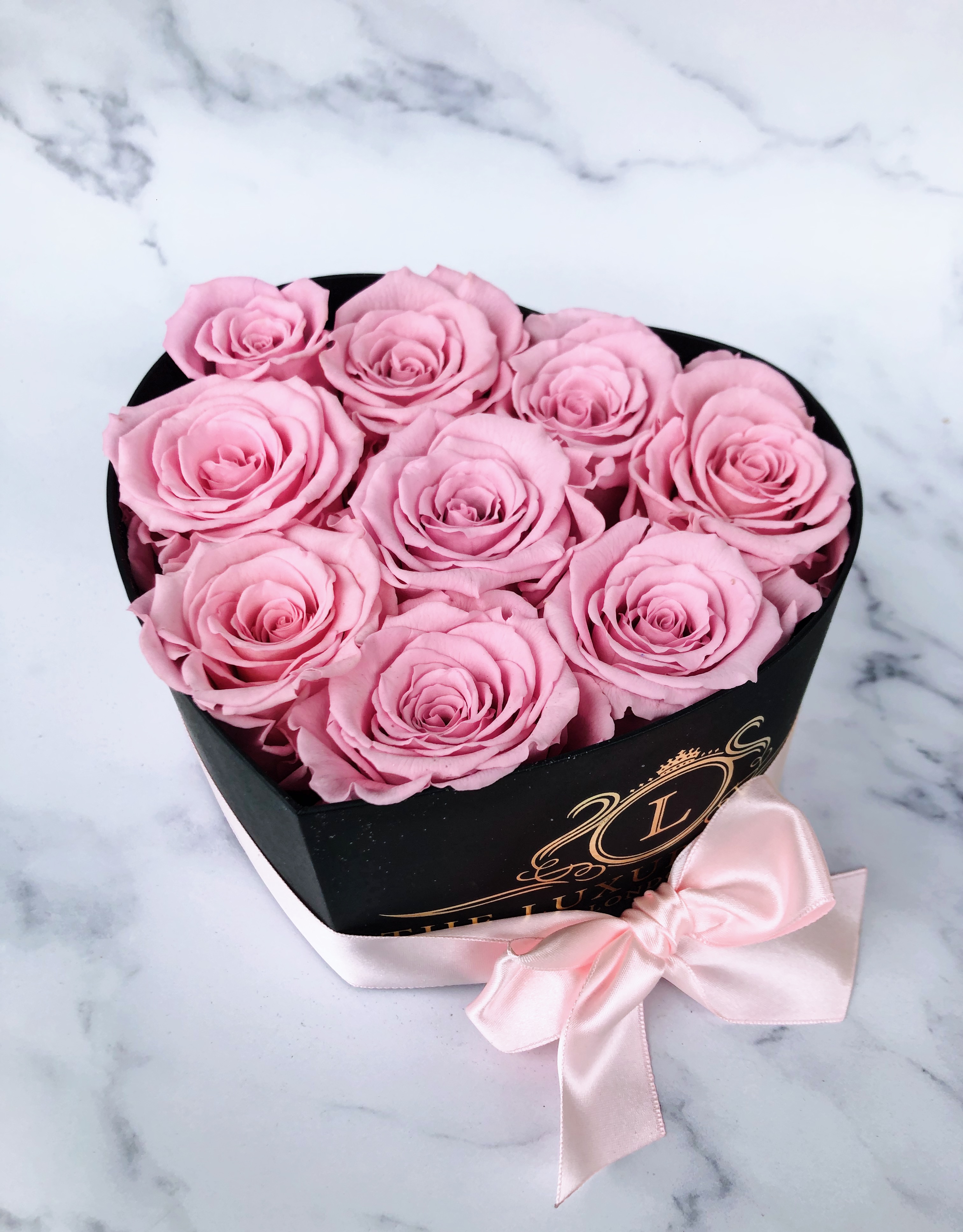 Mini heart shaped box of infinity roses that last a year Preserved